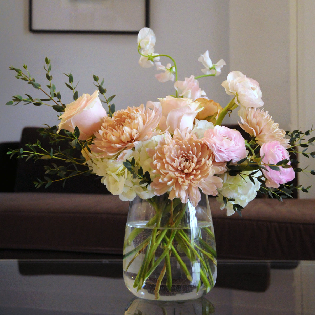 Spruce flowers France arrangement shown in Raindrop vase