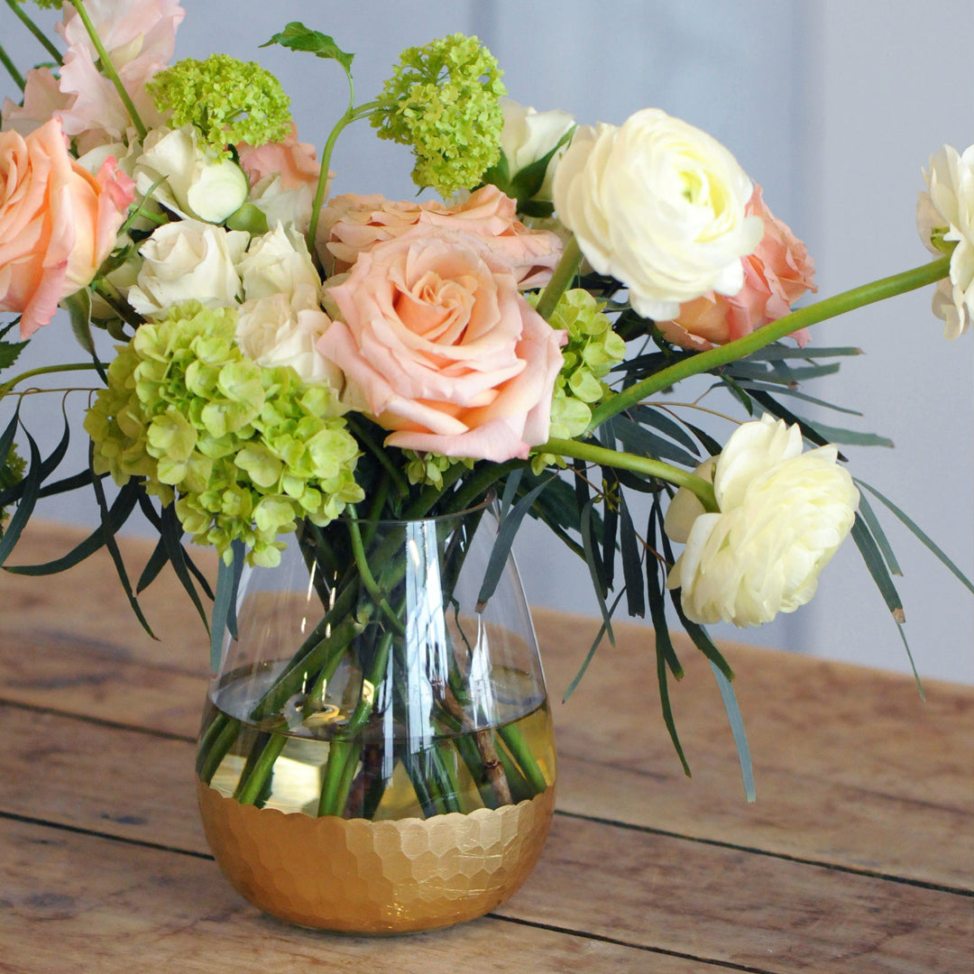 Zoomed in image of Lyndale arrangement focusing on the roses and Ranunculus. Available for delivery in Minneapolis and St Paul