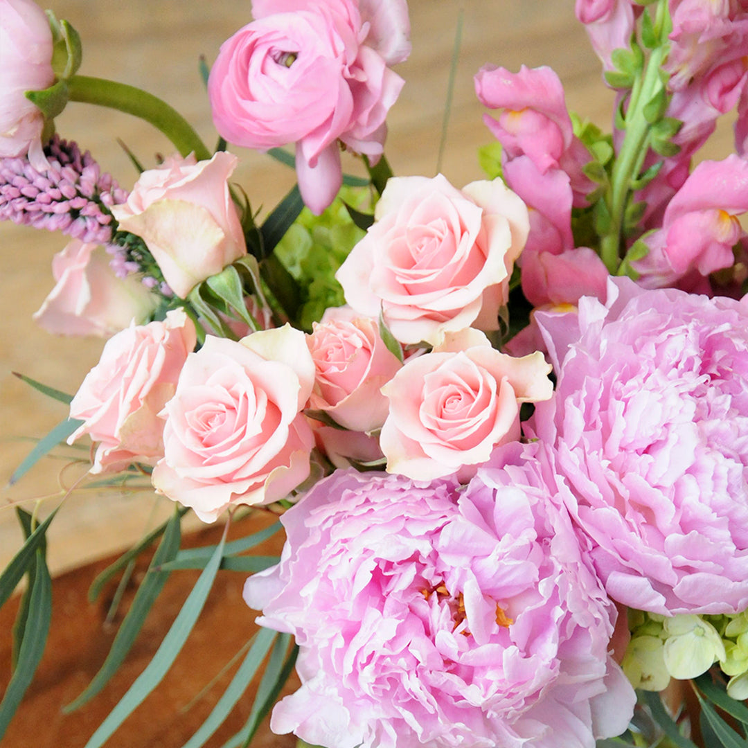 Close up image of Spray roses and Peonies