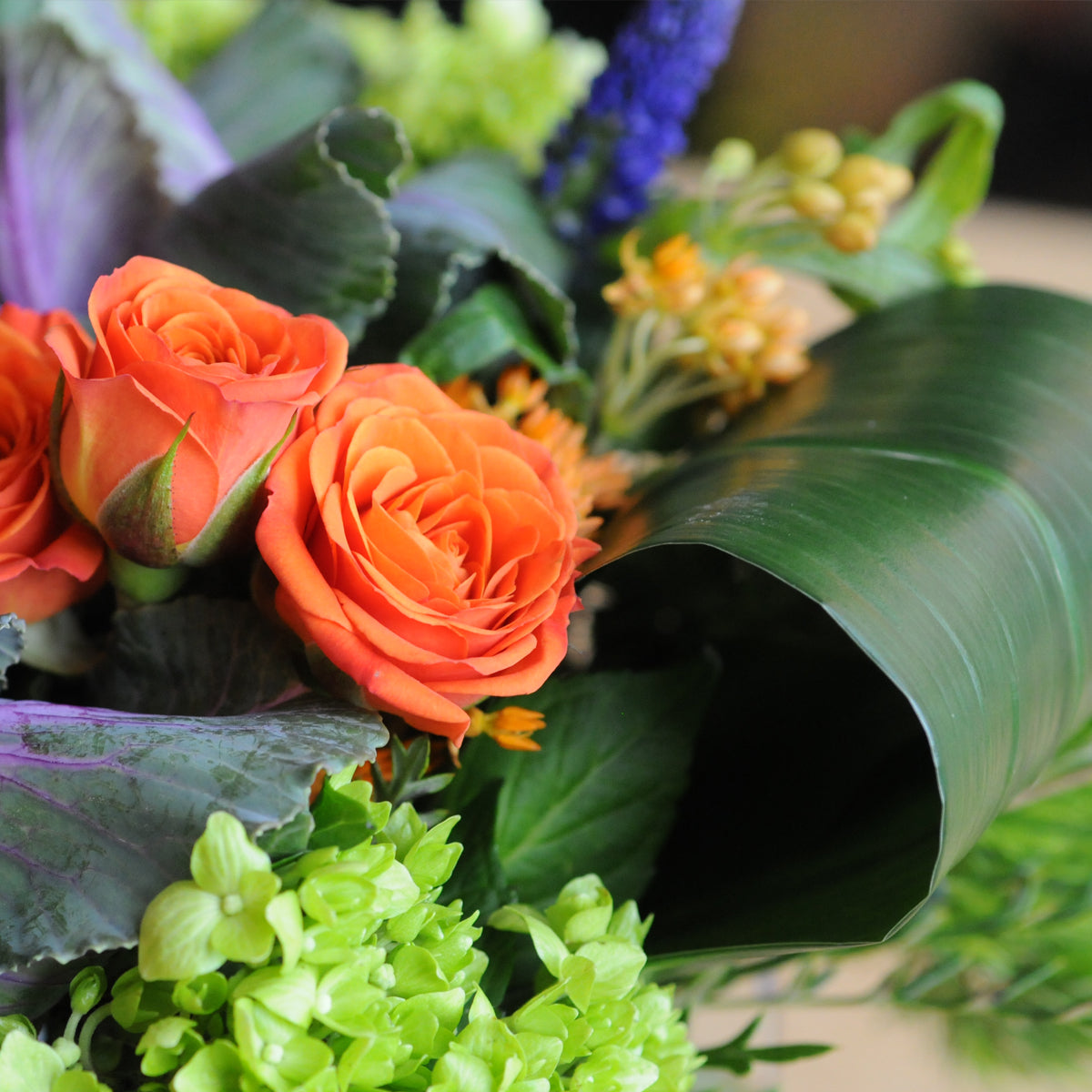 With a roll of Aspidistra leaf the Bryant arrangement is a Spruce flowers main stay available year round for delivery in Minneapolis and St Paul