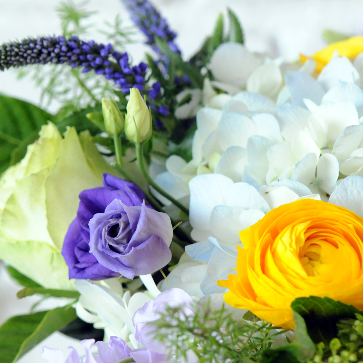 Detailed view of florals styled Creative Director image is an example of the styling rather than the exact arrangement that will be sent