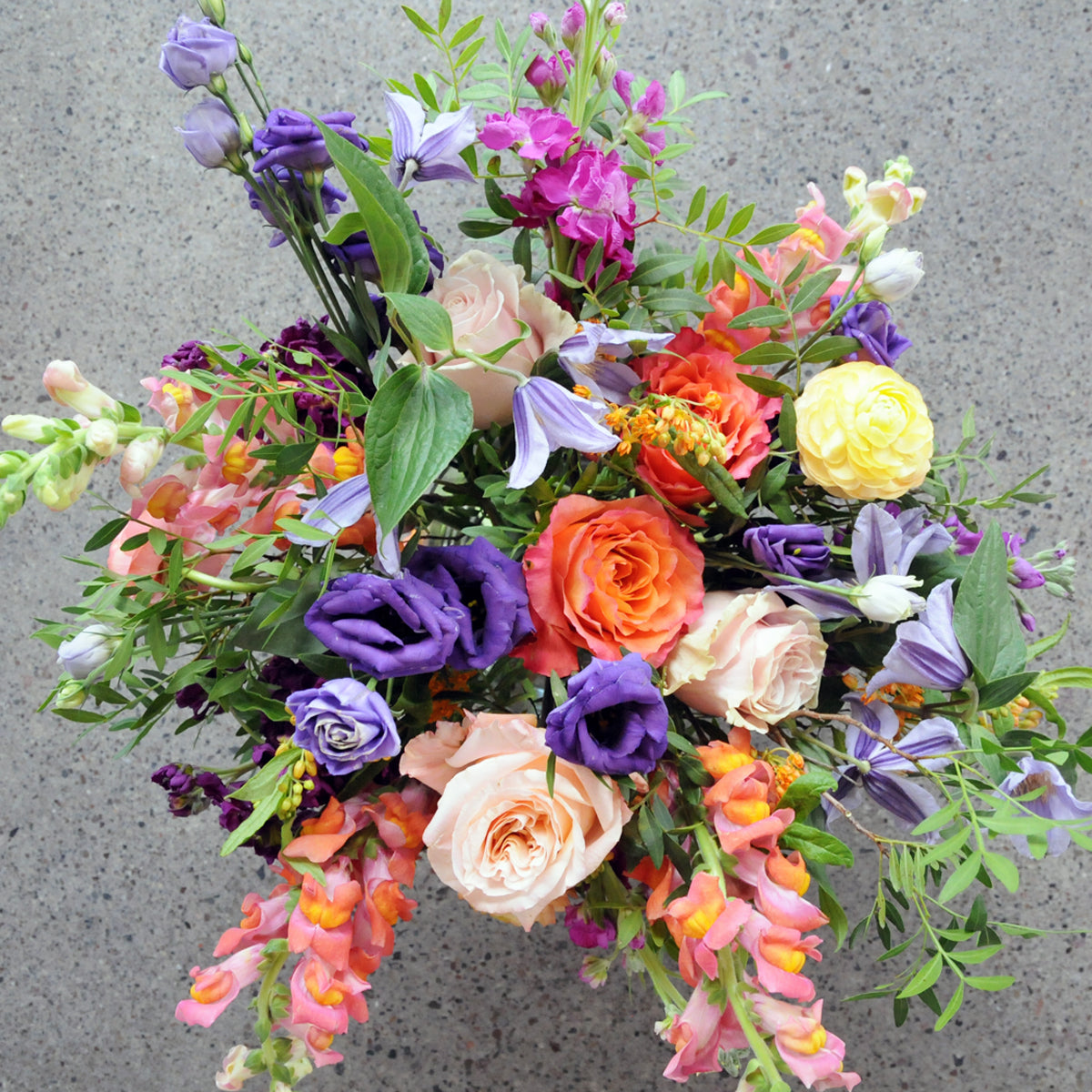 Top down the Channing arrangement shows is sumptuous blooms arranged in a whimsical style, perfect to celebrate that special occasion, whether its a birthday or anniversary, or simply just to say I love you.