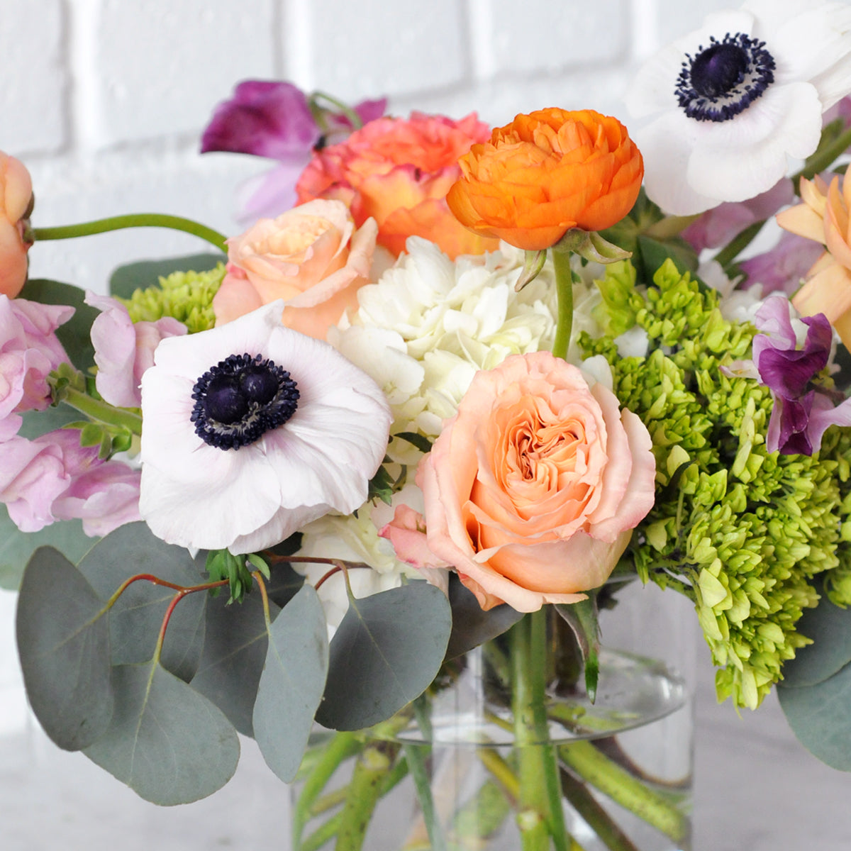 detaile d view of the mixed florals in Spruce Flowers Cheyenne arrangement