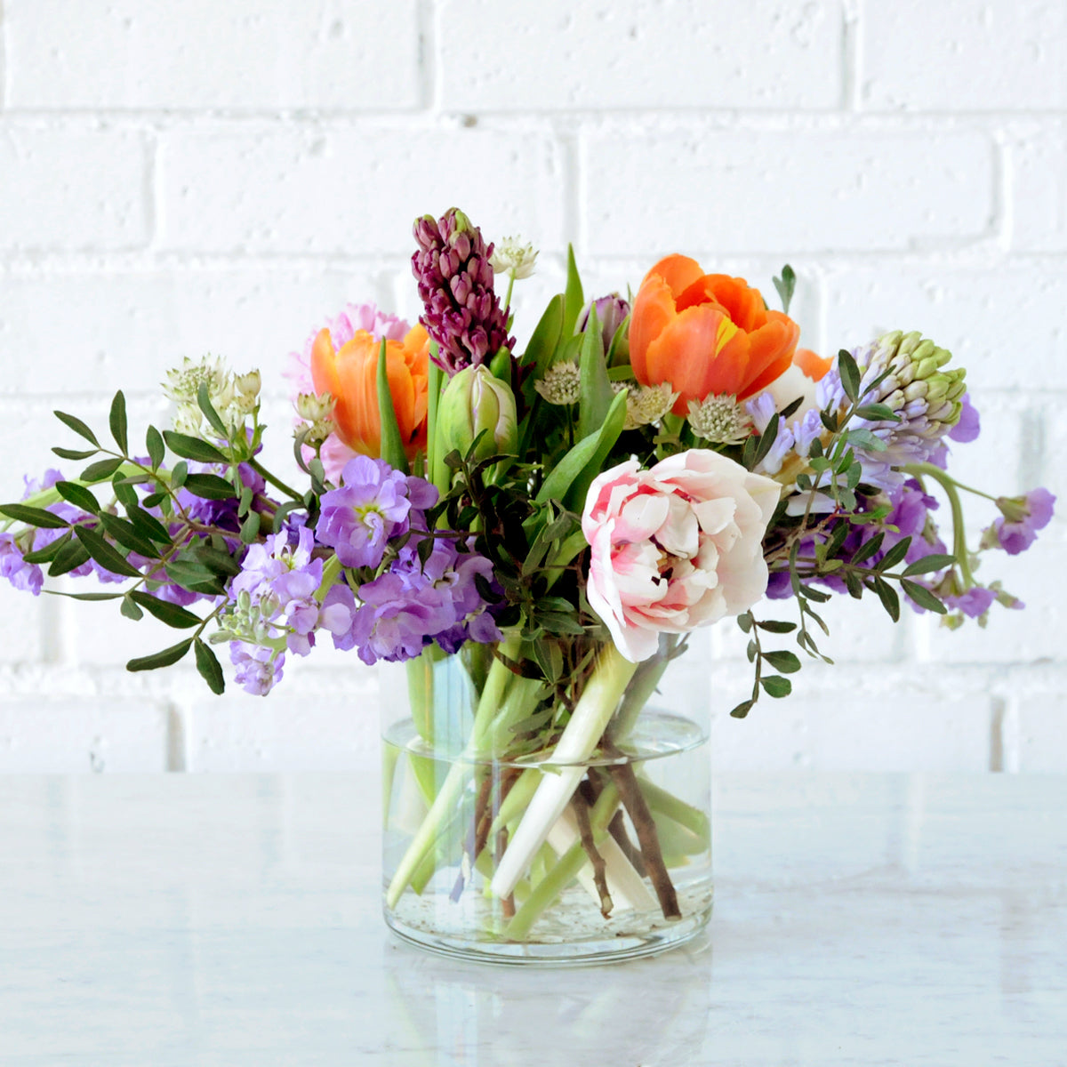 Spring St from Spruce Flowers a vibrant spring mix of favorites such as tulips and Hyacinth for fresh flower delivery in Minneapolis & St Paul