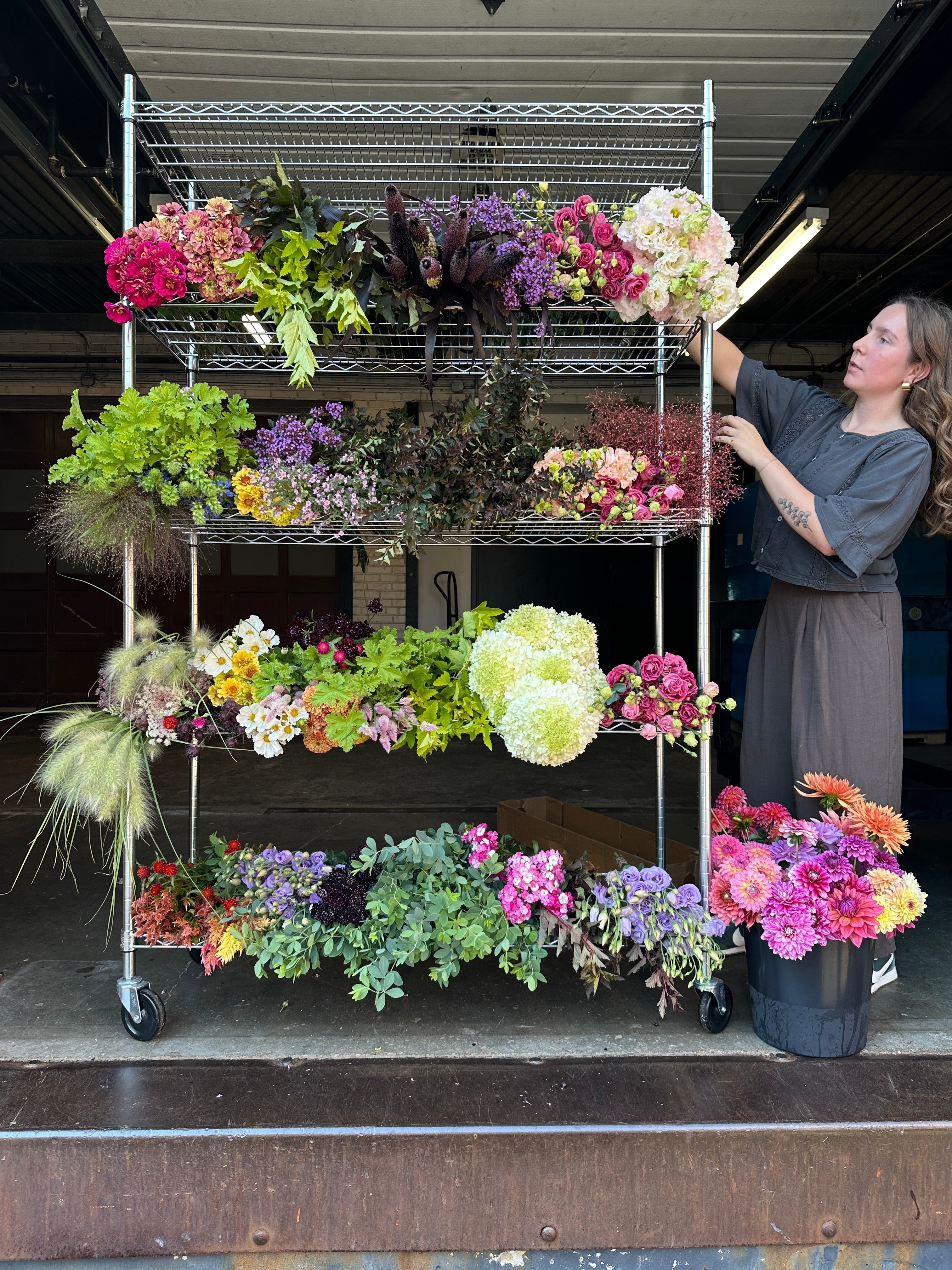 Locally Grown Blooms on A Rack 