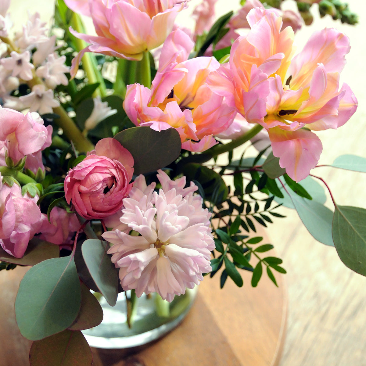 Pink and white spring flower arrangement with tulips and ranunculus from Spruce Flowers Minneapolis