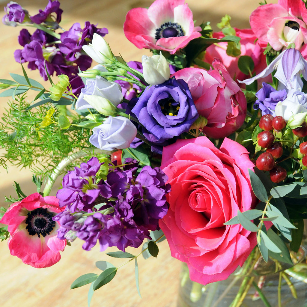 Purple and Pink blooms feature in the Aldrich flower arrangement