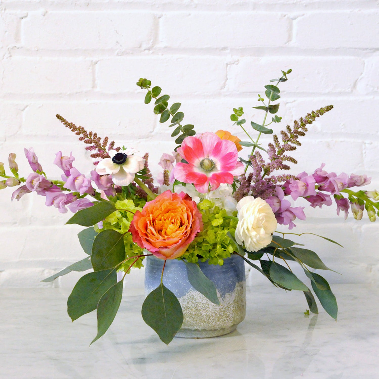 Small cheyenne arrangement in ceramic vase 