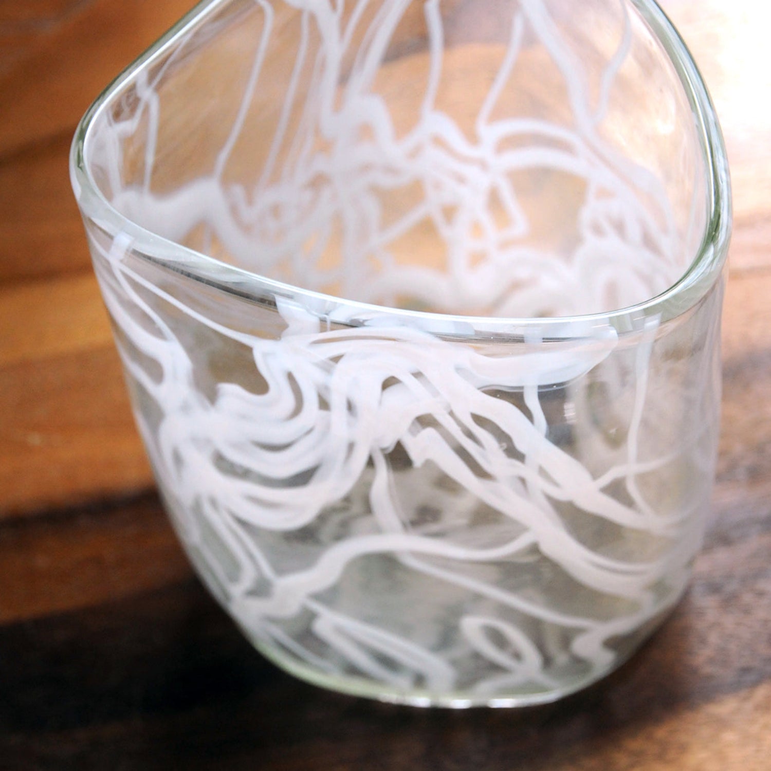 Clear glass Vase showing detail of white ribbon effect within the glass