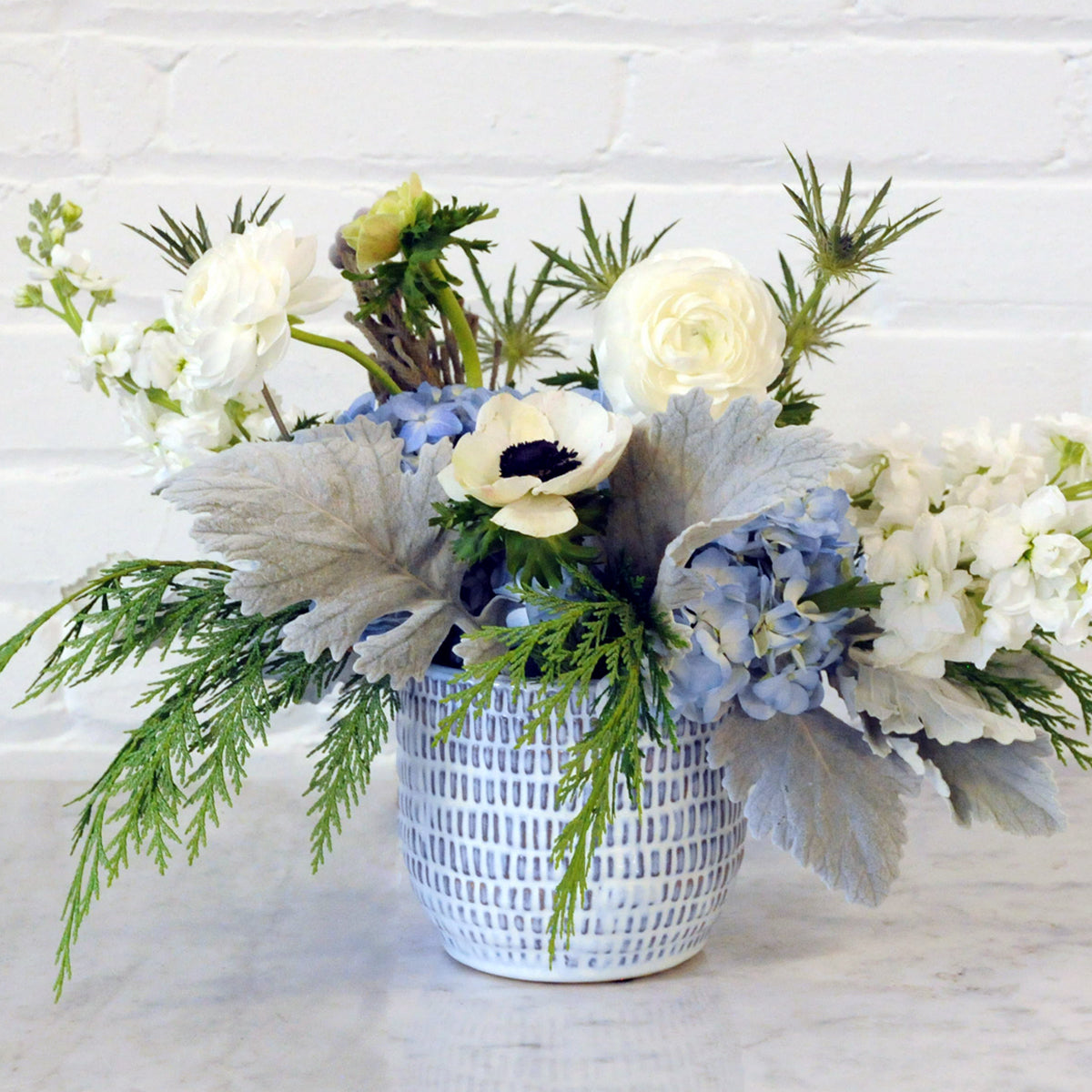 Image of front of Fremont arrangement showing the Blue and White ceramic vase 