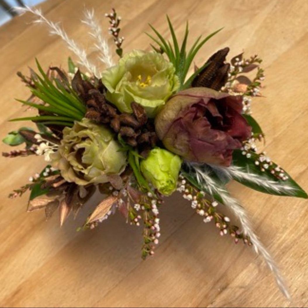 Floral arrangement on a wooden surface