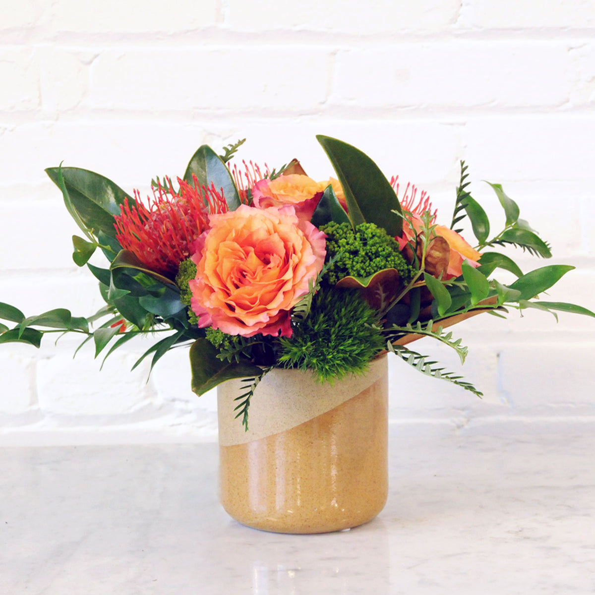 Front image Parkway arrangement in Tan Vase 