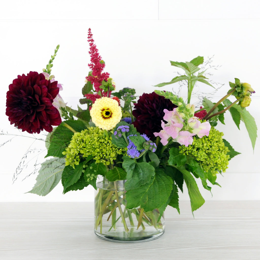Our Buchanan Floral arrangement a celebration of summer featuring Dahlias and other locally grown seasonal elements 