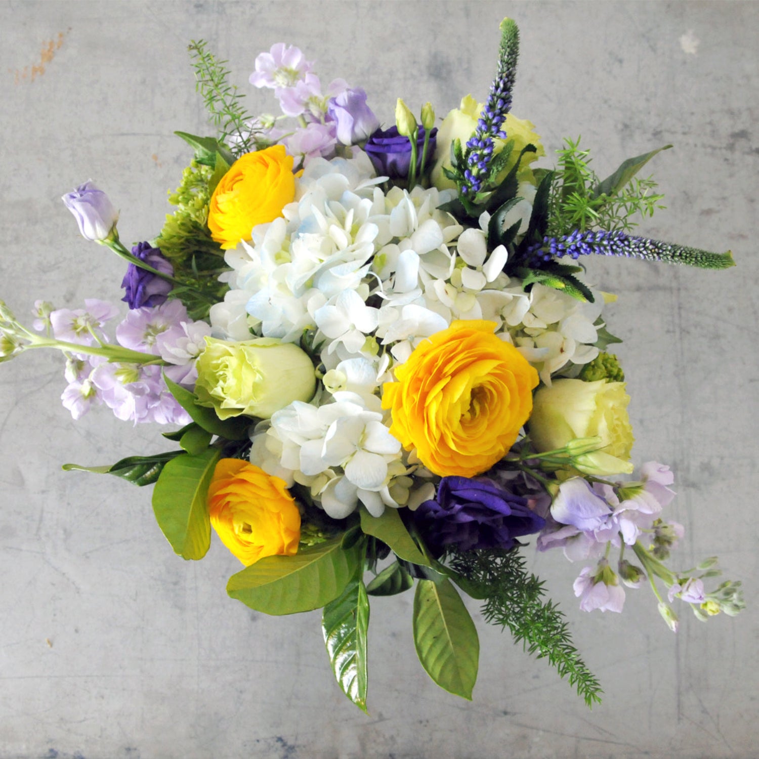 Top down view of a bright Classic Creative Director,  image is an example of the styling rather than the exact arrangement that will be sent 