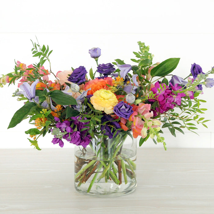 Spruce Flowers Channing arrangement is a classic mix of summer favorites from Asclepias through to Stock and Snapdragons a floral celebration perfect for any special occasion, delivery throughout the Minneapolis and Saint Paul Twin Cities Metro. 
