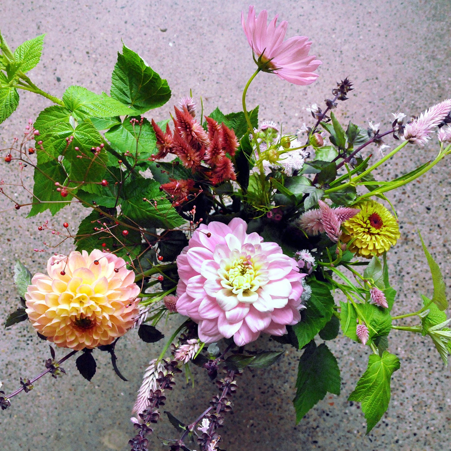 top down view of the larpenteur arrangement featuring a pastel mix of local blooms