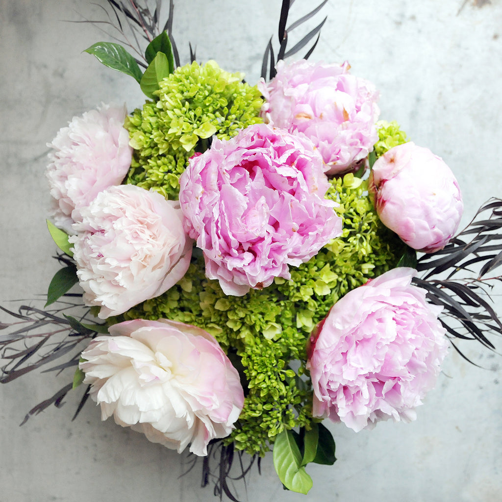 Top down image of Portland Flower arrangement for Spring featuring Peonies for delivery in Minneapolis and St Paul